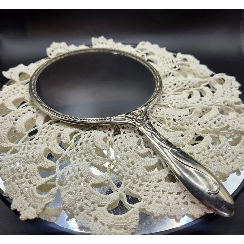 Heavy Vintage Antique Silver Plated Ornate Vanity Hand Mirror 8.75” x 5”
